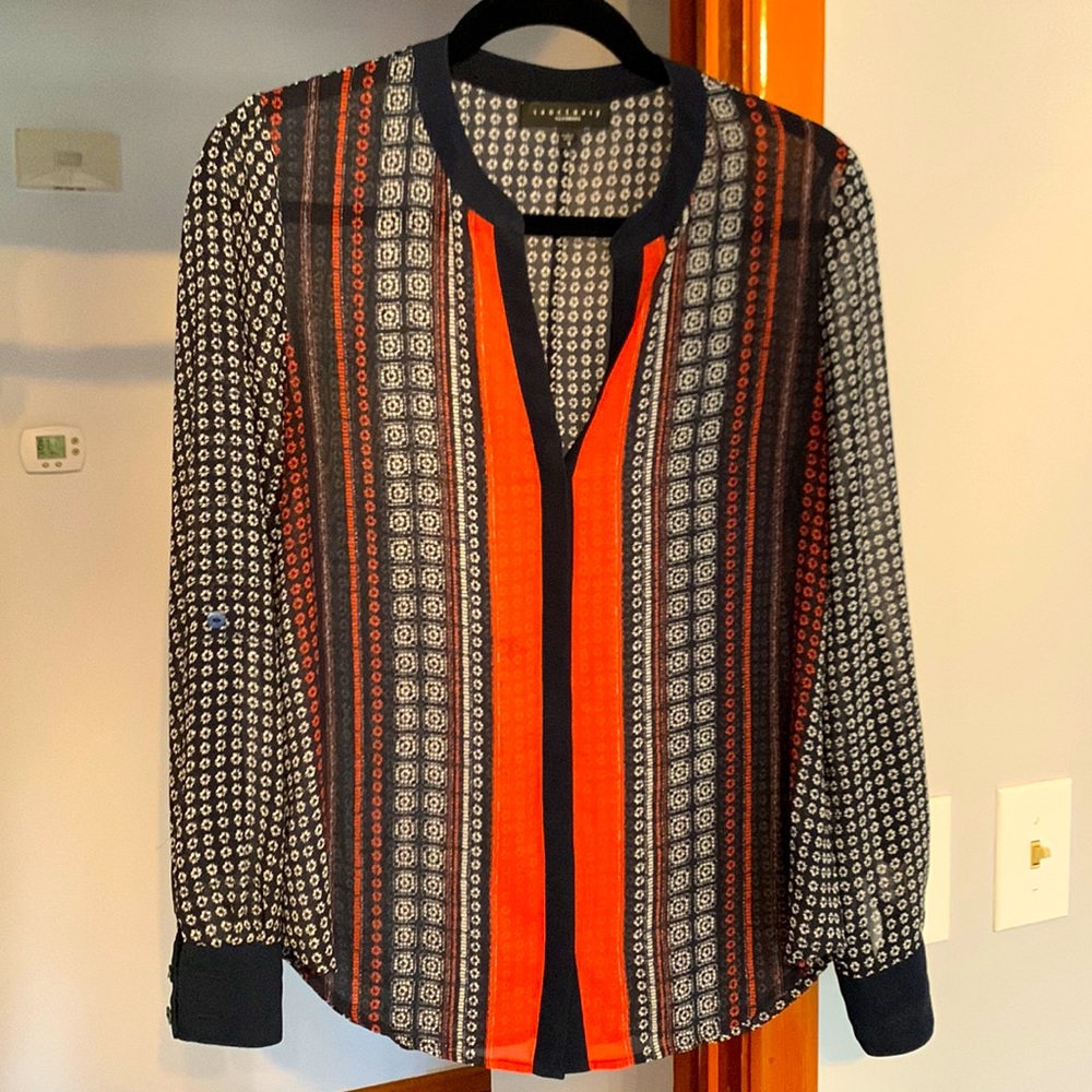Long sleeve blouse by Sanctuary with roll up sleeves secured with a button.